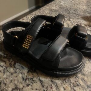 Dior Black Leather Logo Strap Sandals with Gold Lettering